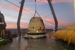 In this Tuesday, Feb. 10, 2015 file photo made available by SpaceX, their Dragon capsule sits aboard a ship in the Pacific Ocean west of Mexico's Baja Peninsula after returning from the International Space Station, carrying about 3,700 lbs of cargo for NASA. SpaceX announced Monday, Feb. 27, 2017 that it would send two paying customers to the moon next year on a private flight aboard its Dragon capsule. The company said the unnamed customers have paid “a significant deposit” for the moon trip.