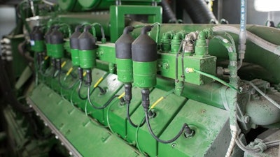 A view of a 16-cylinder generator as seen during a tour inside the Lowell Energy AD Biodigester on Thursday, September 8, 2016, in Lowell, Michigan.