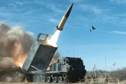 A TACMS long-range missile takes flight from a Lockheed Martin M270A1 launcher during a test.