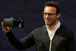 In this Thursday, June 11, 2015, file photo, Oculus CEO Brendan Iribe holds up the Rift virtual reality headset during a news conference in San Francisco. In a verdict reached Wednesday, Feb. 1, 2017, Facebook's virtual-reality subsidiary and two of its founders, Iribe and Palmer Luckey, are facing a sobering reality after a jury hit them with a $500 million bill for infringing on the rights of a video-game maker.