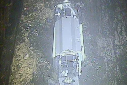 This Feb. 16, 2017 photo released by Tokyo Electric Power Co. (TEPCO) shows a remote-controlled 'scorpion' robot inside the Unit 2 reactor's containment vessel at Fukushima Dai-ichi nuclear power plant in Okuma town, Fukushima prefecture, northeastern Japan. Robot probes sent to one of Japan's wrecked Fukushima nuclear reactors have suggested worse-than-anticipated challenges for the plant's ongoing cleanup.