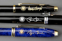 In this Tuesday, Feb. 14, 2017, photo A.T. Cross Co. custom-made pens designed for President Donald Trump, top, former President Barack Obama, center, and former President George W. Bush, below, featuring their signatures and presidential seals, rest side by side at the Cross Company Store in Providence, R.I.
