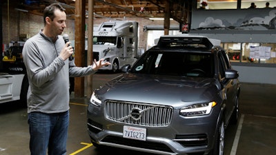 In this Dec. 13, 2016, file photo, Anthony Levandowski, head of Uber's self-driving program, speaks about their driverless car in San Francisco. A self-driving car company founded by Google is accusing a former top engineer of stealing pivotal technology that is propelling Uber's effort to assemble a fleet of automated vehicles for its popular ride-hailing service. The complaint cites evidence that Levandowski, a former manager in Google's self-driving car project, loaded 14,000 confidential files on a laptop before leaving to start his own company in 2016.