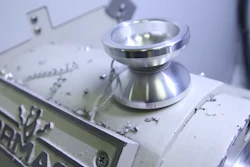 A yo-yo cut from a piece of aluminum stock on the 15L Slant-PRO Lathe.
