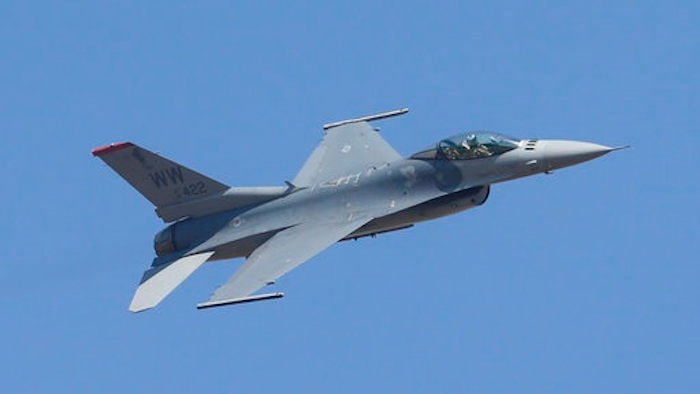 In this Feb. 16, 2017, file photo, a U.S. fighter aircraft F-16 performs during the Aero India 2017 at Yelahanka air base in Bangalore, India. The Trump administration told Congress on Wednesday, March 29, that it plans to approve a multibillion-dollar sale of F-16 fighter jets to Bahrain without the human rights conditions imposed by the Obama administration.