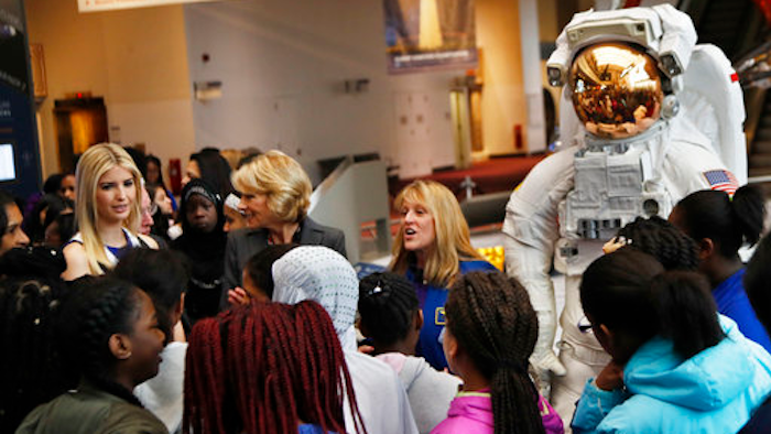 Ivanka Trump, left, Education Secretary Betsy DeVos, center, listens as NASA Astronaut Kay Hire speaks to female students at the Smithsonian's National Air and Space Museum in Washington, Tuesday, March 28, 2017, to celebrate Women's History Month.