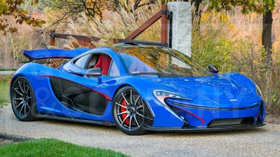 This 2015 McLaren P1 was auctioned to endow a new department chair at the Rose-Hulman Institute of Technology. It has 1,126 miles on it.