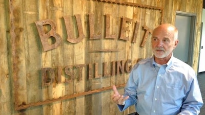 In this Thursday, March 9, 2017, photo, Tom Bulleit, founder of the Bulleit Distilling Co., talks about the brand's future at its new distillery outside Shelbyville, Ky. Bulleit's parent company, spirits giant Diageo, sees the $115 million distillery as a catalyst for more momentum for the fast-growing brand.