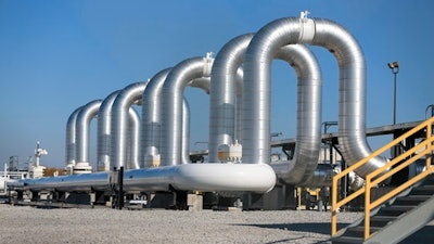 FILE - In this Nov. 3, 2015, file photo, the Keystone Steele City pumping station, into which the planned Keystone XL pipeline is to connect to, is seen in Steele City, Neb. The Keystone XL oil pipeline won't use American steel in its construction, despite what President Donald Trump says. White House spokeswoman Sarah Huckabee Sanders said Friday that's due to language in a presidential directive Trump issued in Jan. 2017. The Keystone pipeline would run from Canada to refineries in the Gulf Coast.