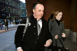 Barry Cadden, center, arrives at the federal courthouse, Thursday, March 16, 2017, in Boston, before scheduled closing arguments in his trial. Cadden, a former pharmacy executive and the president of New England Compounding Center, is charged with causing the deaths in 2012 of 25 people who received tainted steroids manufactured by the pharmacy.