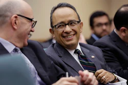 Carlos Gonzalez Gutierrez, center, Mexico's consul general in Austin, waits to give testimony to the Committee on International Trade and Intergovernmental Affairs at the Texas Capitol, Monday, March 6, 2017, in Austin, Texas. Officials from Mexico and Texas are urging the state's lawmakers to defend the North American Free Trade Agreement against President Donald Trump's administration, which has been wary of it.