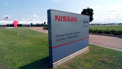 FILE - This sign photographed April 20, 2011, proclaims the location of the Nissan auto manufacturing facility in Canton, Miss. The United Auto Workers union charges Friday, March 3, 2017, that Nissan Motor Co. broke federal labor law hours less than two days before a Saturday rally in Mississippi where U.S. Sen. Bernie Sanders and others plan to speak in favor of unionization. The UAW says that on Thursday, a company security guard wrongfully stopped workers from handing out literature and asking fellow employees to authorize a union vote outside a gate of the Canton plant.