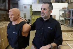 In this Monday, Feb. 27, 2017, photo, Tom Nardone, owner of PriveCo, which sells bulletproof vests, poses in his warehouse in Troy, Mich., with a mannequin wearing a test vest. In more than a hundred videos he's posted on YouTube, Nardone takes aim at racks of ribs, laptop computers and tires to illustrate what a bulletproof vest can do. While he advertised in magazines and went to gun shows, he realized that to reach a wider audience he needed to be online. And he didn't want a demonstration of just the vests.