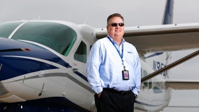 In this Tuesday, March 28, 2017, photo, Air Choice One CEO Shane Storz poses for a photo with one of his company's aircraft in St. Louis. Air Choice One is an airline based in St. Louis that flies small planes to destinations in the Midwest and participates in the Department of Transportation's Essential Air Service subsidy program. Air Choice One would lose revenue if the Trump administration succeeds in ending funding for the Essential Air Service program, says Storz. The carrier gets federal subsidies under the program aimed at making it easier for people who live in rural areas to catch flights nearer their homes.