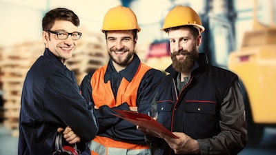 Smiling Workers In Front Of Forklift 505531350 2131x1411 58c7d8712a3f7