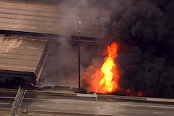 In this aerial image made from a video provided by WSB-TV, a large fire that caused an overpass on Interstate 85 to collapse burns in Atlanta, Thursday, March 30, 2017. Witnesses say troopers were telling cars to turn around on the bridge because they were concerned about its integrity. Minutes later, the bridge collapsed.