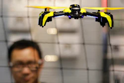 In this Jan. 5, 2017 file photo, a drone flies in Las Vegas. The world’s largest manufacturer of civilian drones is proposing that drones be required to continually transmit identification information to help government security agencies and law enforcement figure out which might belong to rogue operators.