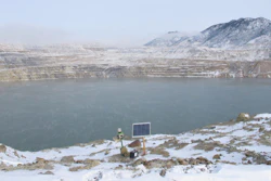 In this Dec. 14, 2016 photo, a Phoenix Wailer bird deterrent sits on the bank of the Berkeley Pit in Butte, Mont. The wailer, which emits different sounds at random times, is one of the devices used to keep birds from landing in the toxic water of the former copper mine. The companies responsible for the pit are proposing additional technologies such as radars, lasers and drones to prevent another mass death similar to the several thousand snow geese that died in the pit last November.