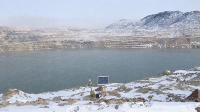 In this Dec. 14, 2016 photo, a Phoenix Wailer bird deterrent sits on the bank of the Berkeley Pit in Butte, Mont. The wailer, which emits different sounds at random times, is one of the devices used to keep birds from landing in the toxic water of the former copper mine. The companies responsible for the pit are proposing additional technologies such as radars, lasers and drones to prevent another mass death similar to the several thousand snow geese that died in the pit last November.