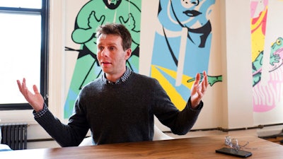 In this March 13, 2017 photo, Scott Heiferman, CEO of Meetup, talks during an interview in New York. The online networking site is partnering with a left-leaning labor union and a former Hillary Clinton aide to roll out a platform for organizing people who oppose President Donald Trump.