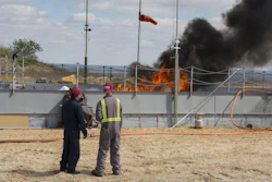 The Flame Refluxer prototype is tested in the burn pan at the Joint Maritime Test Facility in Mobile, Ala., part of tests conducted between March 13-17, 2007.