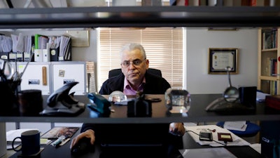 Investigator Peter Humphrey poses for portraits at his home near Redhill, England, Tuesday, March 7, 2017. When investigators Peter Humphrey and Yu Yingzeng were hired by pharmaceutical company GlaxoSmithKline in 2013, their job was to look into a former employee in China who, they were told, was making false allegations about GSK. The employee, it turns out, was a whistleblower who had revealed a GSK practice of bribes in China.