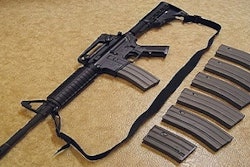 The XM15-E2S semi-automatic rifle and magazines.