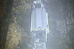 This Feb. 16, 2017 photo released by Tokyo Electric Power Co. (TEPCO) shows a remote-controlled 'scorpion' robot inside the Unit 2 reactor's containment vessel at Fukushima Dai-ichi nuclear power plant in Okuma town, Fukushima prefecture, northeastern Japan. Robot probes sent to one of Japan's wrecked Fukushima nuclear reactors have suggested worse-than-anticipated challenges for the plant's ongoing cleanup.