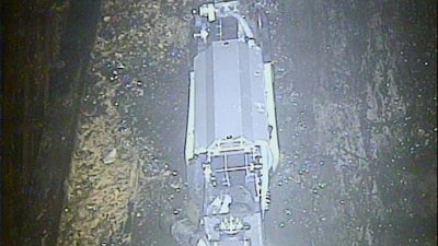 This Feb. 16, 2017 photo released by Tokyo Electric Power Co. (TEPCO) shows a remote-controlled 'scorpion' robot inside the Unit 2 reactor's containment vessel at Fukushima Dai-ichi nuclear power plant in Okuma town, Fukushima prefecture, northeastern Japan. Robot probes sent to one of Japan's wrecked Fukushima nuclear reactors have suggested worse-than-anticipated challenges for the plant's ongoing cleanup.