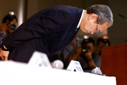 Toshiba Corp. President Satoshi Tsunakawa bows during a press conference at the company's headquarters in Tokyo, Wednesday, March 29, 2017. Japan's embattled Toshiba said Wednesday that its U.S. nuclear unit Westinghouse Electric Co. has filed for bankruptcy protection. Toshiba said in a statement that it filed the chapter 11 petition in the U.S. Bankruptcy Court of New York.