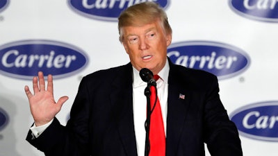 In this Dec. 1, 2016, file photo, President-elect Donald Trump speaks at the Carrier Corp. factory in Indianapolis. The $7 million deal to save jobs at the Carrier factory in Indianapolis is poised for approval by state officials nearly four months after President Donald Trump celebrated his role in the negotiations with a post-election visit to the plant.