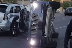A self-driving Uber SUV rolled onto it’s side after a collision in Tempe, AZ.