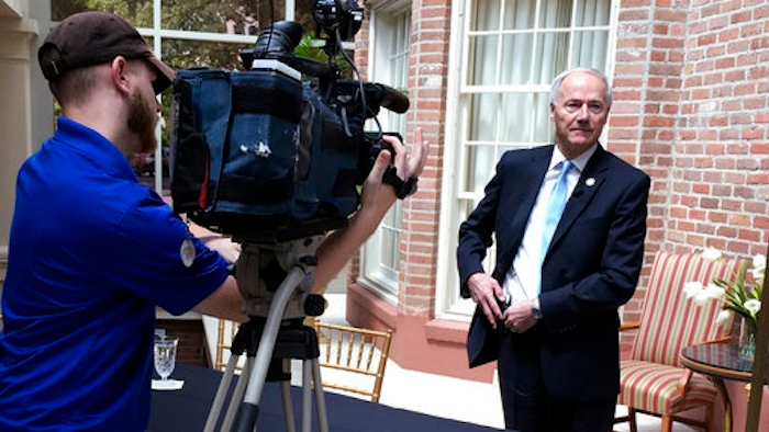 Arkansas Gov. Asa Hutchinson prepares for a TV station interview at the Governor's Mansion on Thursday, April 13, 2017, in Little Rock. The governor met with reporters to discuss a series of seven upcoming executions.