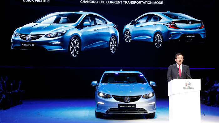 SAIC-GM president Wang Yongping announces the global launch of the Buick Velite 5, an extended range electric hybrid, during a global launch event ahead of the Shanghai Auto 2017 show in Shanghai, China, Tuesday, April 18, 2017. At the auto show, the global industry's biggest marketing event of the year, almost every global and Chinese auto brand is showing at least one electric concept vehicle, if not a market-ready model.