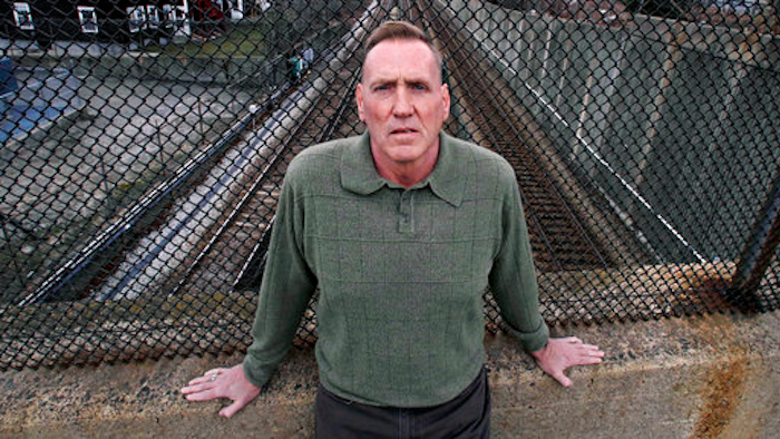 In this Friday, April 7, 2017 photo, Jimmy Duran poses near Phoenix House, a drug and alcohol rehabilitation facility, in Quincy, Mass. Duran was prescribed opioids for years after hurting his neck and fracturing vertebrae in a workplace accident in 2004. 'OxyContin, Percocet, morphine,' he recalled. 'It ruined my life. It brought me to my knees.' Clean now, he's become a licensed counselor at a substance abuse prevention and treatment program.