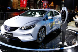 Visitors take photos of the Buick Velite 5, an extended range electric hybrid, during a global launch event ahead of the Shanghai Auto 2017 show in Shanghai, China, Tuesday, April 18, 2017. At the auto show, the global industry's biggest marketing event of the year, almost every global and Chinese auto brand is showing at least one electric concept vehicle, if not a market-ready model.