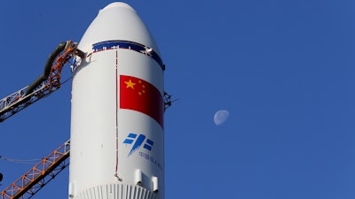 In this Monday, April 17, 2017 photo released by China's Xinhua News Agency, a Long March 7 rocket carrying the Tianzhou 1 is transferred to the launching site in Wenchang, south China's Hainan Province. China is preparing to launch its first unmanned cargo spacecraft on a mission to dock with the country's space station. The Tianzhou 1 was due to blast off at 7:41 p.m. (1141 GMT) Thursday atop a latest-generation Long March 7 rocket from China's newest spacecraft launch site.