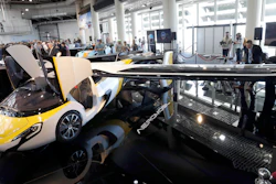 AeroMobil display their latest prototype of a flying car, in Monaco, Thursday, April 20, 2017. The light frame plane whose wings can fold back, like an insect is boosted by a rear propeller. The company says it is planning to accept first preorders for the vehicle as soon as later this year.