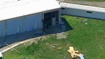 This photo from video by KCTV5 shows damage to the side of a building in the aftermath of a fatal explosion at the Lake City Army Ammunition Plant in Independence, Mo., Tuesday, April 11, 2017.