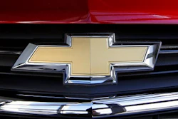 This Monday, April 24, 2017, photo, shows the Chevrolet emblem on the grill of an Equinox compact sport utility vehicle at Quirk Auto Dealers in Manchester, N.H. General Motors Co. reports financial results, Friday, April 28, 2017.