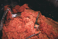 Ground beef, pictured in a food processing plant.