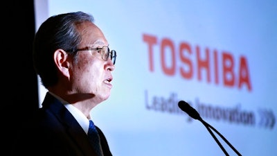 Toshiba Corp. President Satoshi Tsunakawa speaks during a press conference at the company's headquarters in Tokyo, Tuesday, April 11, 2017. Toshiba, whose U.S. nuclear unit Westinghouse Electric Co. has filed for bankruptcy protection, reported unaudited earnings Tuesday and projected a 1.01 trillion yen ($9.2 billion) loss for the fiscal year that ended in March.