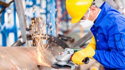 Metal Worker In Factory Grinding Metal Of Pipeline 000058892894 Xxx Large 58f533ef4eaf5