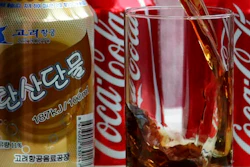 In this Tuesday, April 11, 2017, photo, a can of Air Koryo cola, produced by Air Koryo, the country's flagship airline which recently introduced its own brand of cola on flights to and from Beijing is seen in Pyongyang, North Korea. Coca Cola is possibly the world's most recognizable brand, an almost inescapable symbol of the global appeal of American-style consumer culture. There are only two countries in the world where Coke doesn't officially operate, and one of them is North Korea.