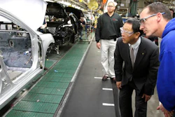 In this Thursday, Feb. 25, 2010, file photo, production team member Steve Turley, right, and Toyota President Akio Toyoda look into a Camry on the assembly line at the Toyota Motor Manufacturing plant in Georgetown, Ky. Toyota said Monday, April 10, 2017, it is investing $1.3 billion to retool its sprawling Georgetown factory, where the company's flagship Camry sedans are built. No new factory jobs are being added, but Toyota says the upgrades amount to the biggest single investment ever at one of its existing plants in the United States.