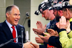 FILE - In this April 13, 2017 file photo Environmental Protection Agency (EPA) Administrator Scott Pruitt, left, shakes hands with coal miners during a visit to Consol Pennsylvania Coal Company's Harvey Mine in Sycamore, Pa. The Trump administration wants to trash Obama-era rules to limit water pollution from coal-fired power plants. Pruitt announced the change this week. Administrator Scott Pruitt sent a letter to a coalition of energy companies that lobbied against the 2015 water pollution rule.