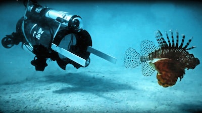 In this artist photo provided by Robots in Service of the Environment shows, taken April 18, 2017, the first day a new robot was used to hunt dangerous and invasive lionfish in Bermuda. It stuns lionfish with an electric current and then the fish is vacuumed into a container alive and it can later be sold for food. The robot caught 15 lionfish in 48 hours of initial testing. New, creative but more high-tech methods may finally be turning the tide in the fight against invasive species. Non-native plants and animals cost the world hundreds of billions of dollars a year.