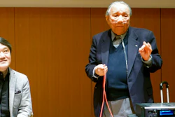 In this Jan. 11, 2013 photo, Ikutaro Kakehashi, right, speaks next to composer Akira Senju during a press conference after he received a Grammy, for developing MIDI, or Musical Instrumental Digital Interface, technology, which digitally connects instruments, in Hamamatsu, central Japan. Kakehashi, who pioneered digital music and founded synthesizer giant Roland Corp., has died, his company ATV Corp. said Monday, April 3, 2017. He was 87.