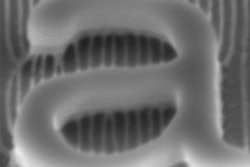 This is a cross-section scanning electron microscopy image after hydrogen silsesquioxane patterning, sequential infiltration synthesis and removal of initiated chemical vapor deposition topcoat and organic components.