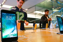 In this Sept. 16, 2016 file photo, The Apple iPhone 7 is displayed at the Apple Store at the Grove in Los Angeles. Mobile chip maker Qualcomm has filed a breach of contract complaint against Apple’s iPhone and iPad manufacturers, the latest in an ongoing dispute.